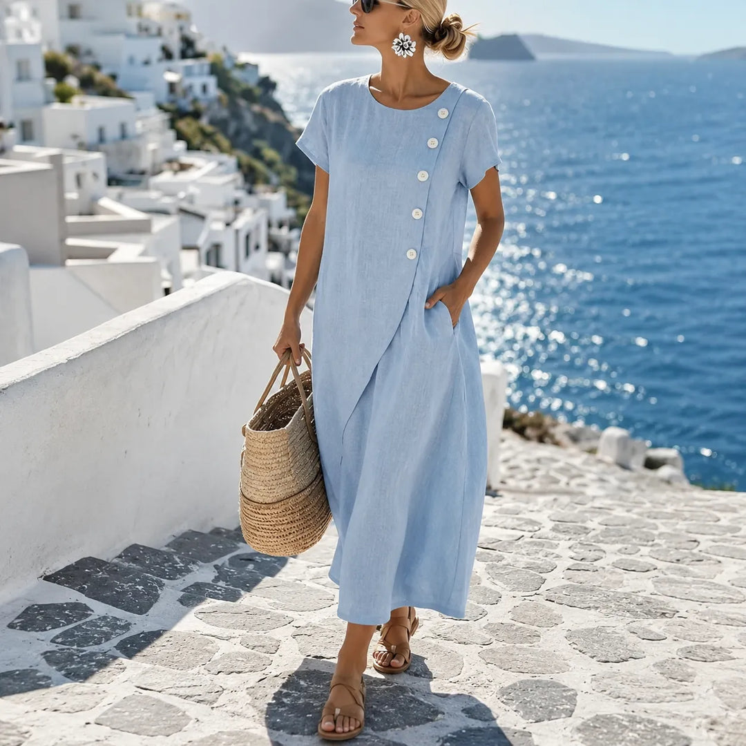Asymmetrische midi-jurk met knoopjes