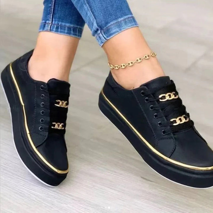 Damessneakers met gouden details