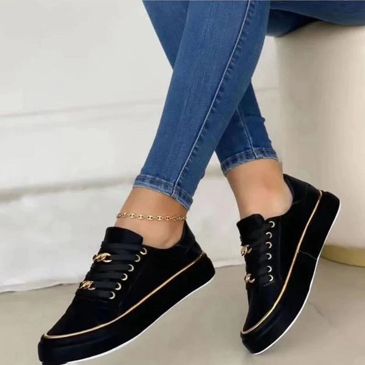 Damessneakers met gouden details