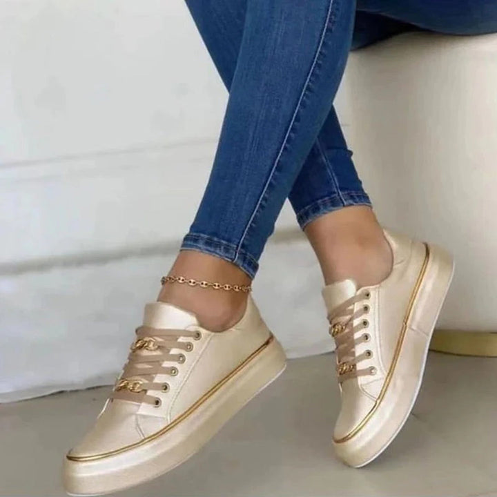 Damessneakers met gouden details
