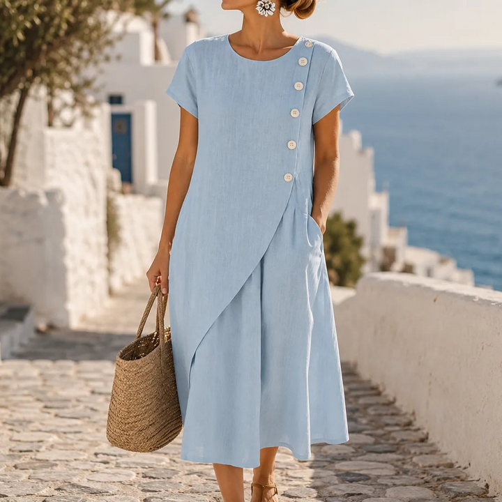 Asymmetrische midi-jurk met knoopjes