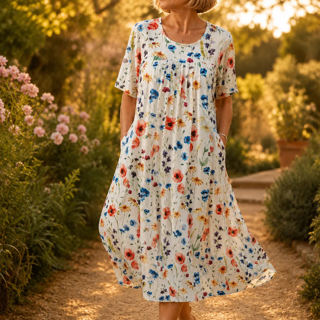 Midi-jurk met bloemenprint en zakken