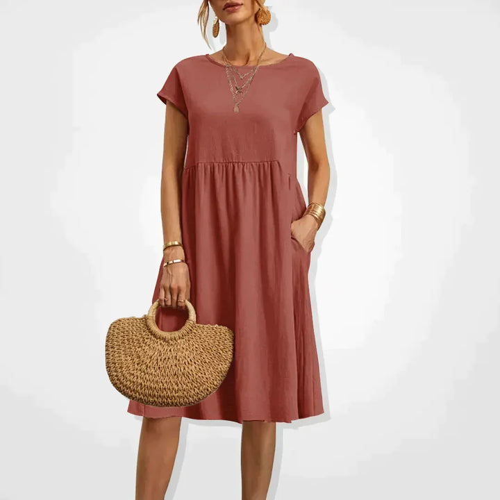 Zomerjurk voor dames in empirestijl met korte mouwen en zakken