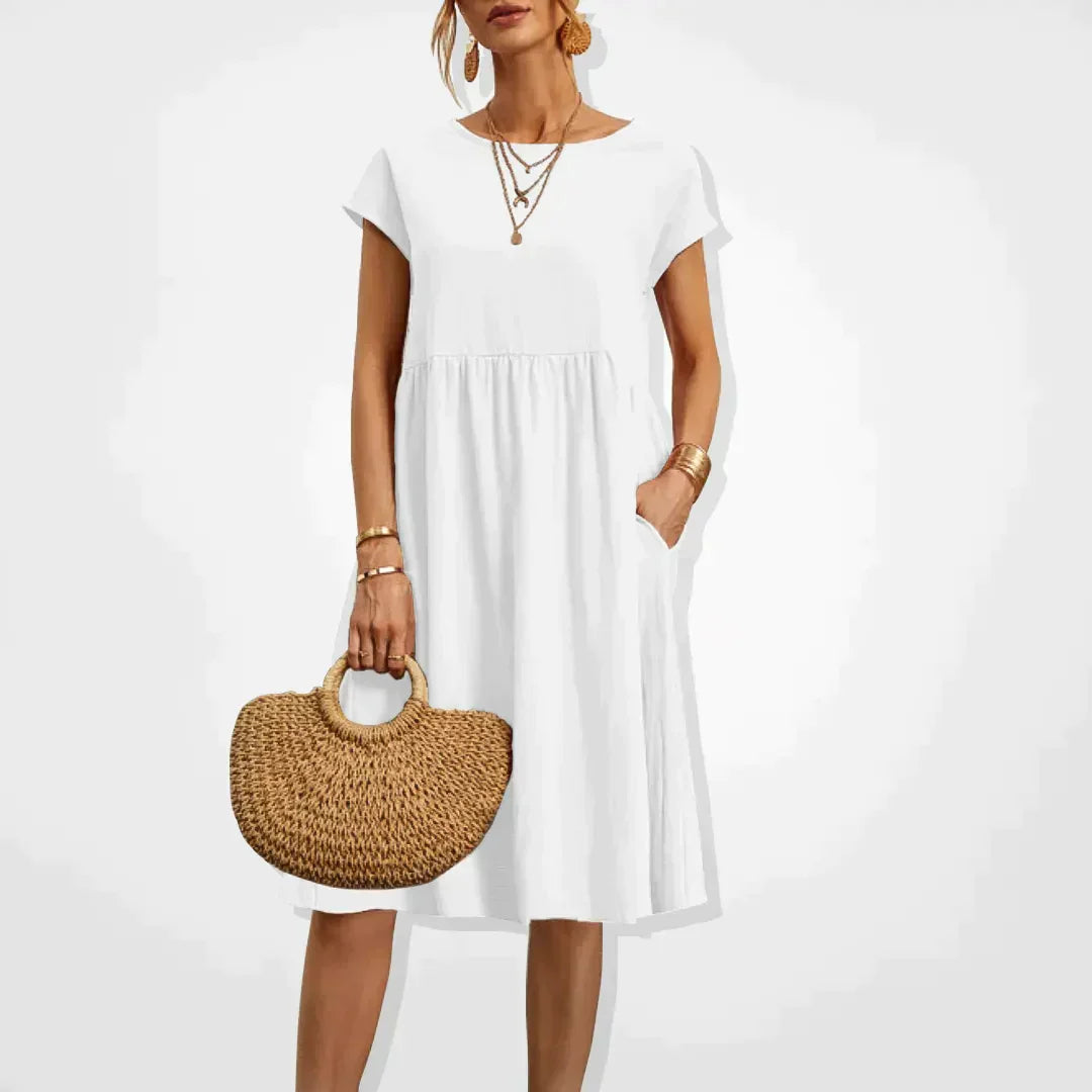 Zomerjurk voor dames in empirestijl met korte mouwen en zakken