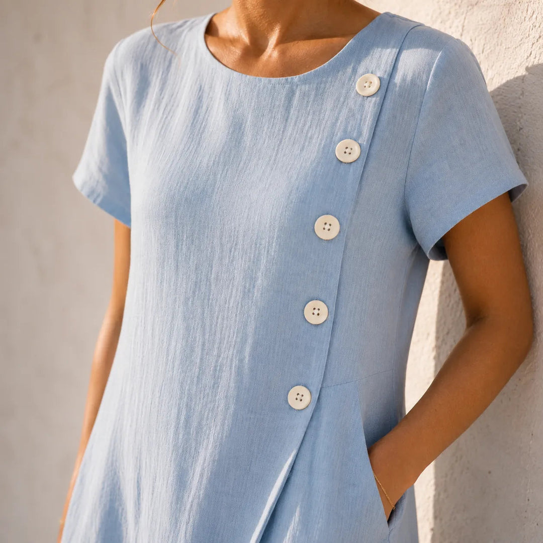 Asymmetrische midi-jurk met knoopjes