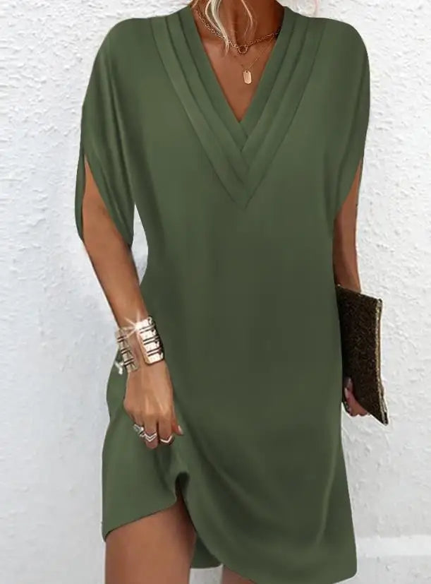 Cocktailjurk voor dames met een asymmetrische v-hals
