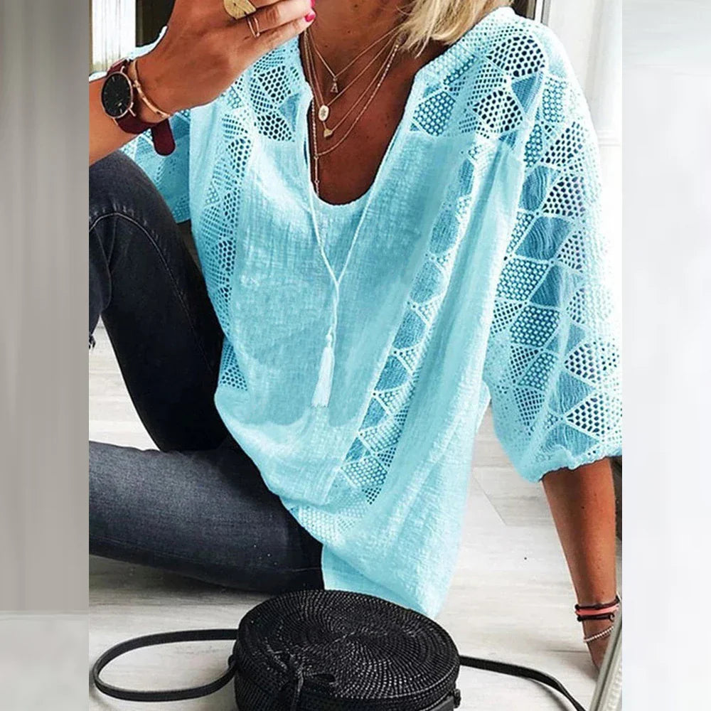 Damesblouse van linnen met opengewerkte details voor de zomer