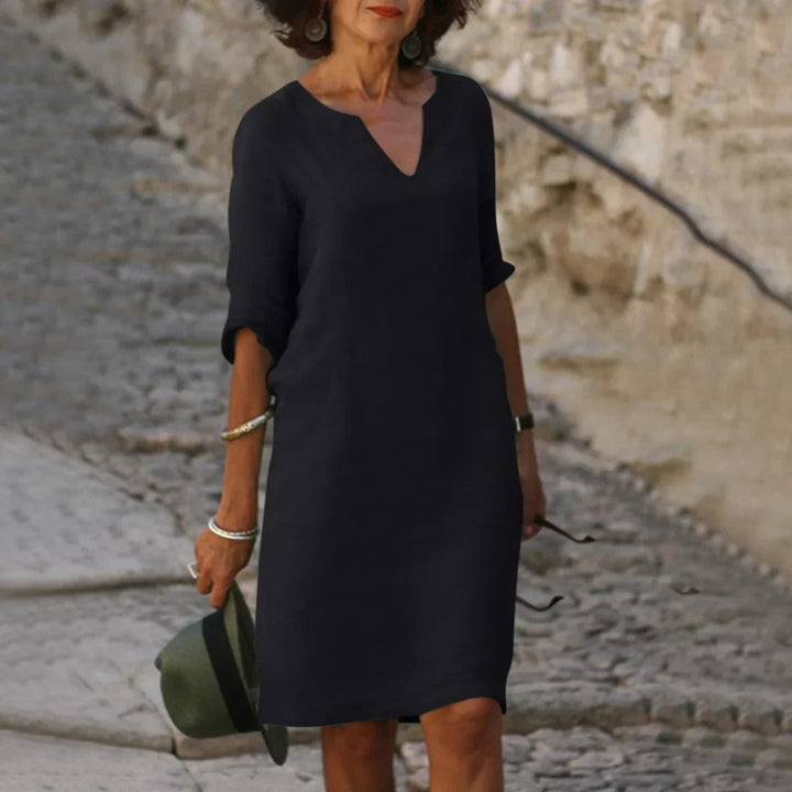 Elegante mini-jurk voor dames met v-hals