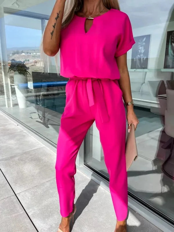 Elegante damesjumpsuit met riem en v-hals