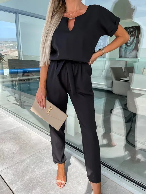 Elegante damesjumpsuit met riem en v-hals