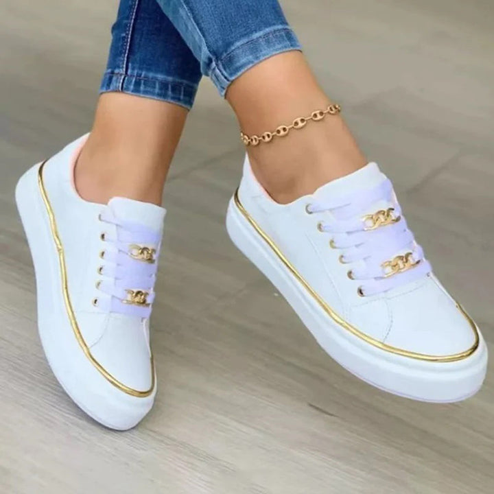 Damessneakers met gouden details