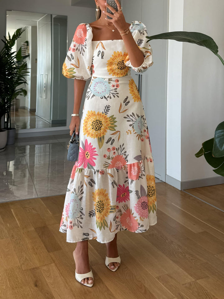 Elegante midi-jurk met pofmouwen