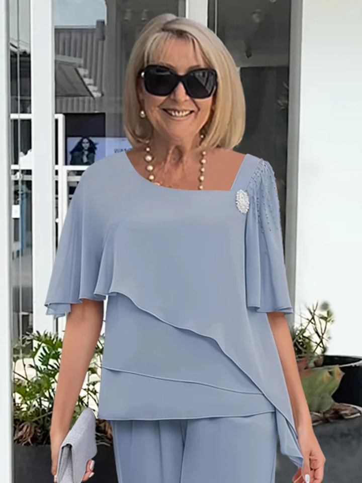 Elegante damesset bestaande uit blouse en broek
