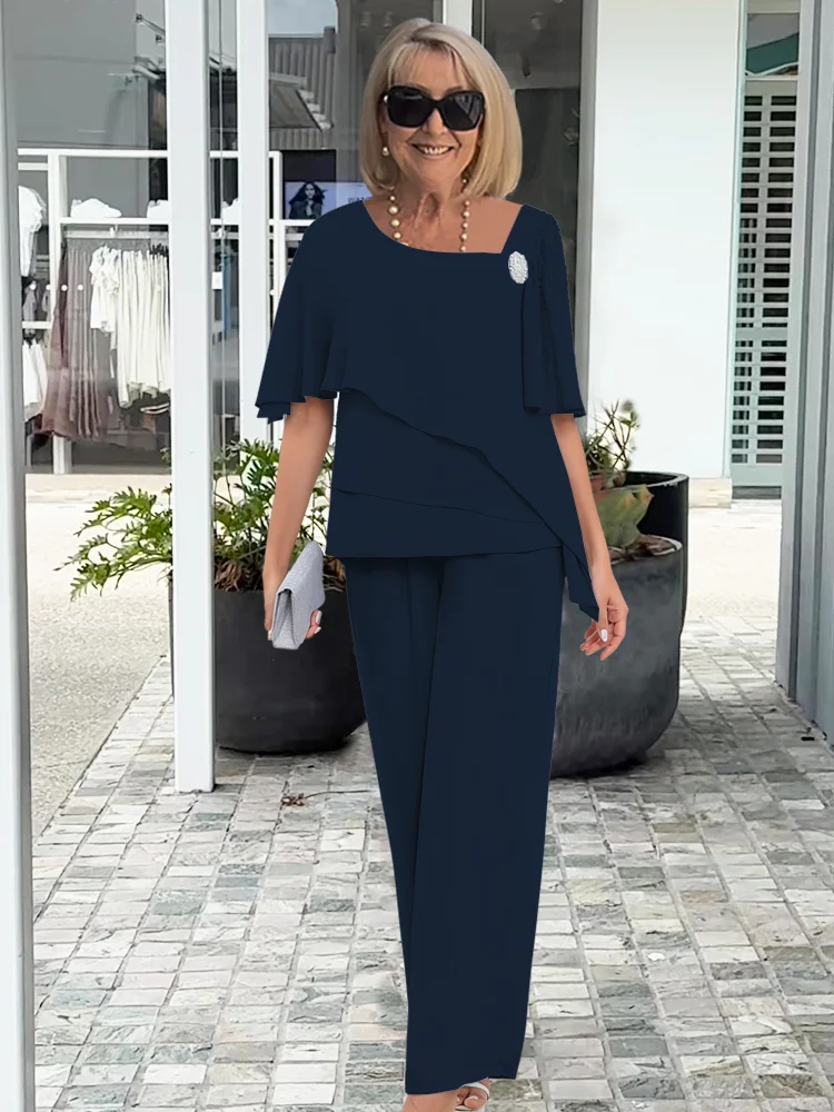 Elegante damesset bestaande uit blouse en broek