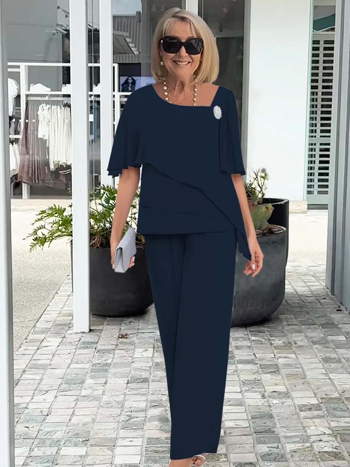 Elegante damesset bestaande uit blouse en broek