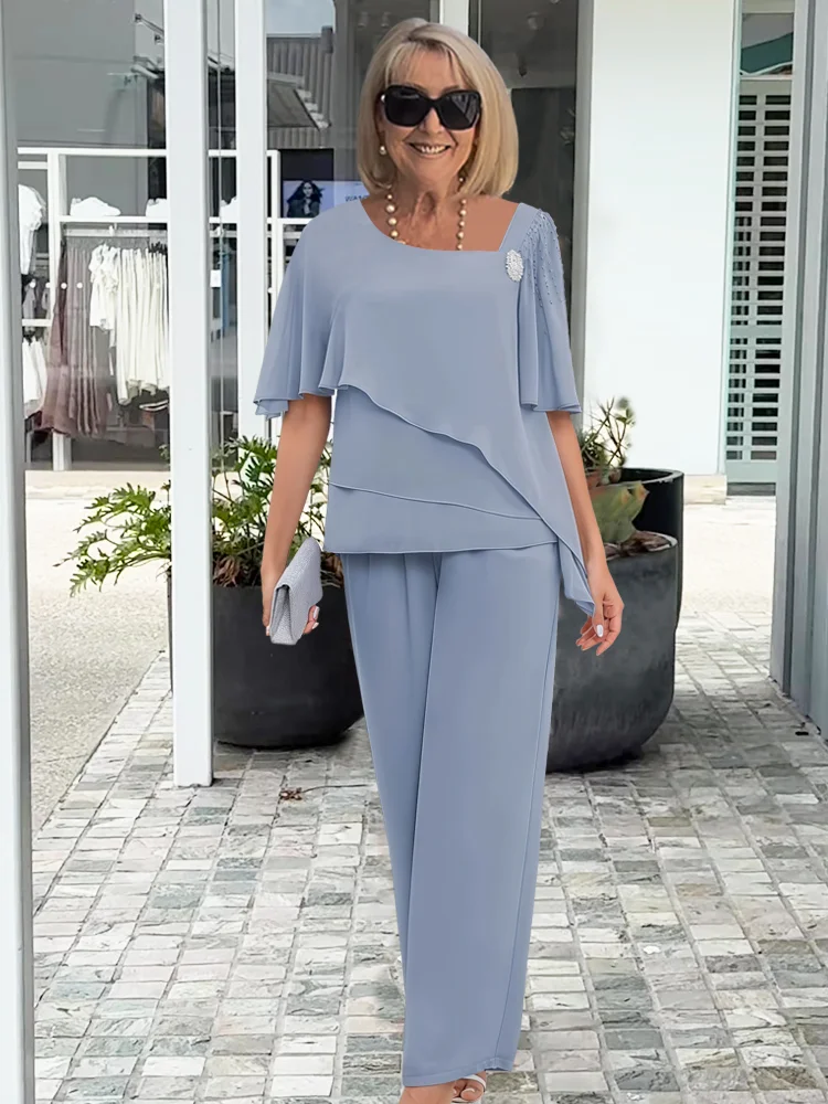 Elegante damesset bestaande uit blouse en broek