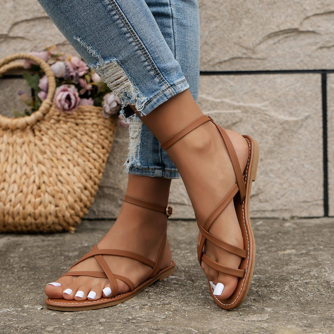 Platte sandalen voor dames met bandjes en gesp