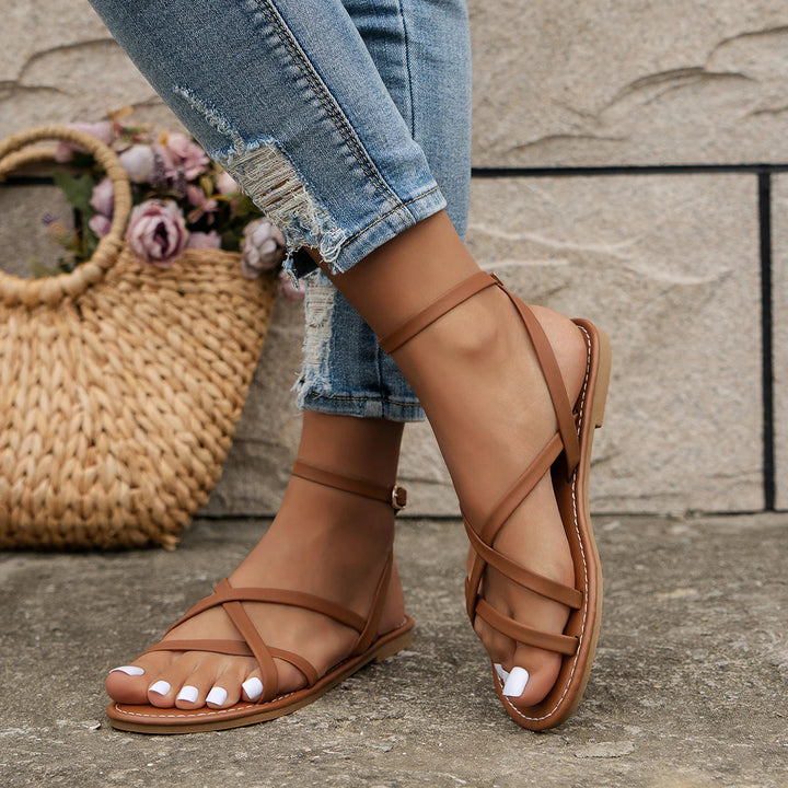 Platte sandalen voor dames met bandjes en gesp